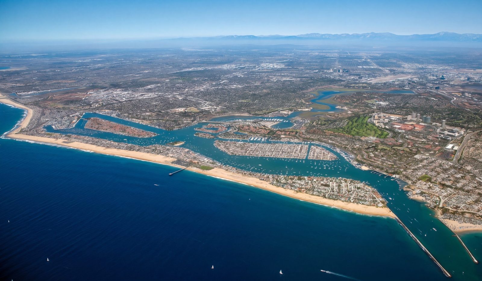 Orange County coastline aerial from Newport to Laguna, Orange County property management by NextGen Coastal