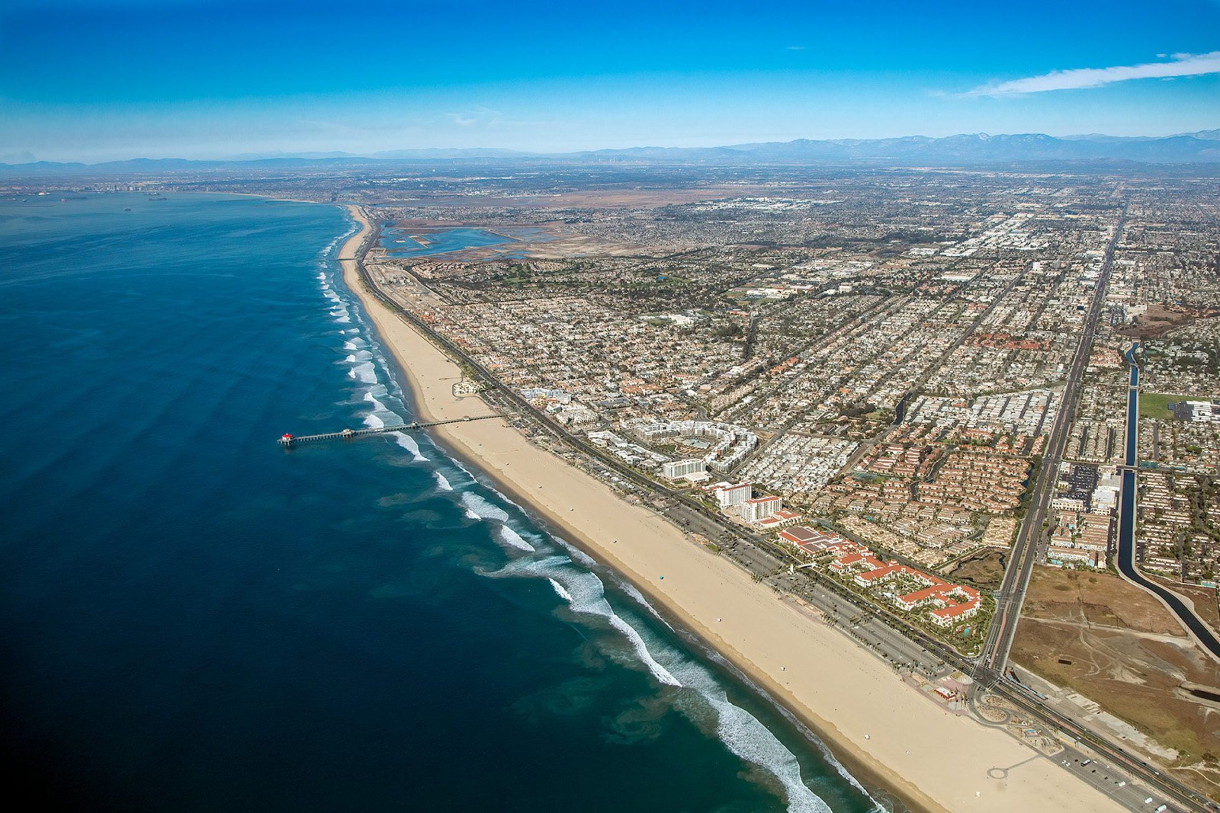 Aerial view of Huntington Beach, Orange County, coastal California property management by NextGen Coastal at fees from 3.9%