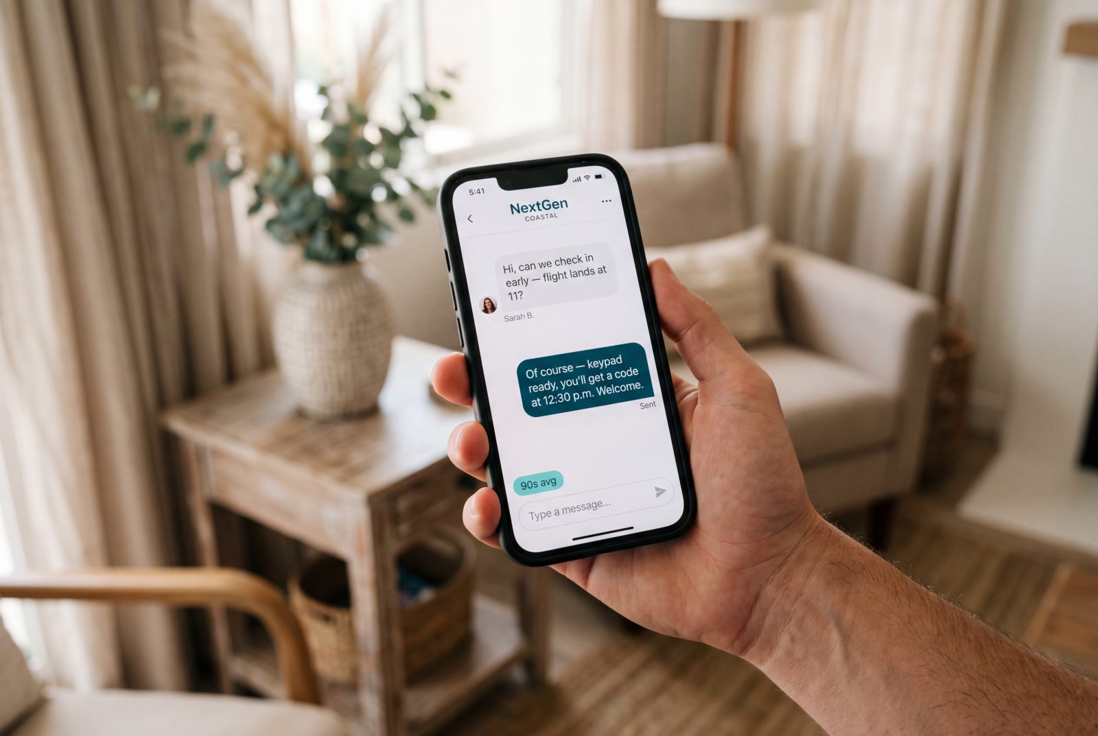 STR guest-messaging chat with a 90-second average reply time, on a smartphone in a coastal vacation rental living room